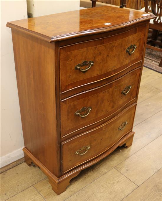 A George III style burr walnut serpentine chest of drawers W.69cm